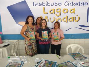 Equipe pedagógica do Instituto Cidadão Lagoa Mundaú e autora Claudia Lins